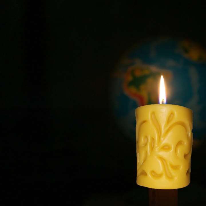 Vine Pillar Beeswax Candle with intricate carved vine design and natural honey scent