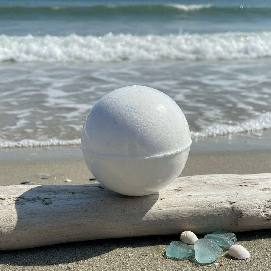 Large Sea Salt & Coconut Water Bath Bomb releasing refreshing coastal fragrance in bathwater