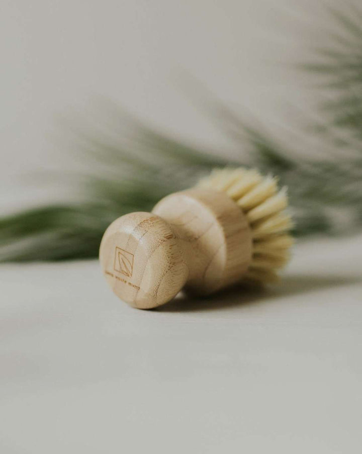 Eco-friendly bamboo pot brush with sisal bristles for sustainable kitchen cleaning