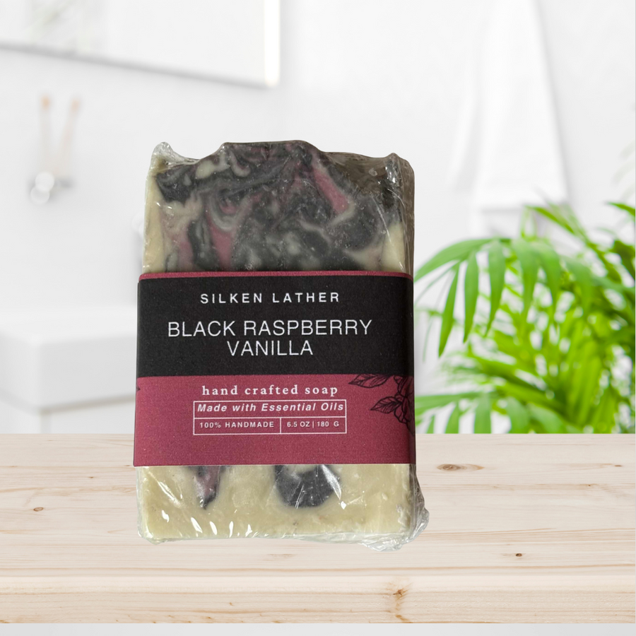 Black Raspberry Vanilla Soap bar with rich raspberry and vanilla swirl design, handcrafted with nourishing oils and butters for creamy hydration and soft skin.