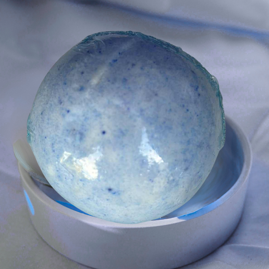Dancing Waters Bath Bomb 150g with oceanic blue swirls and skin-nourishing ingredients for a refreshing, calming bath experience