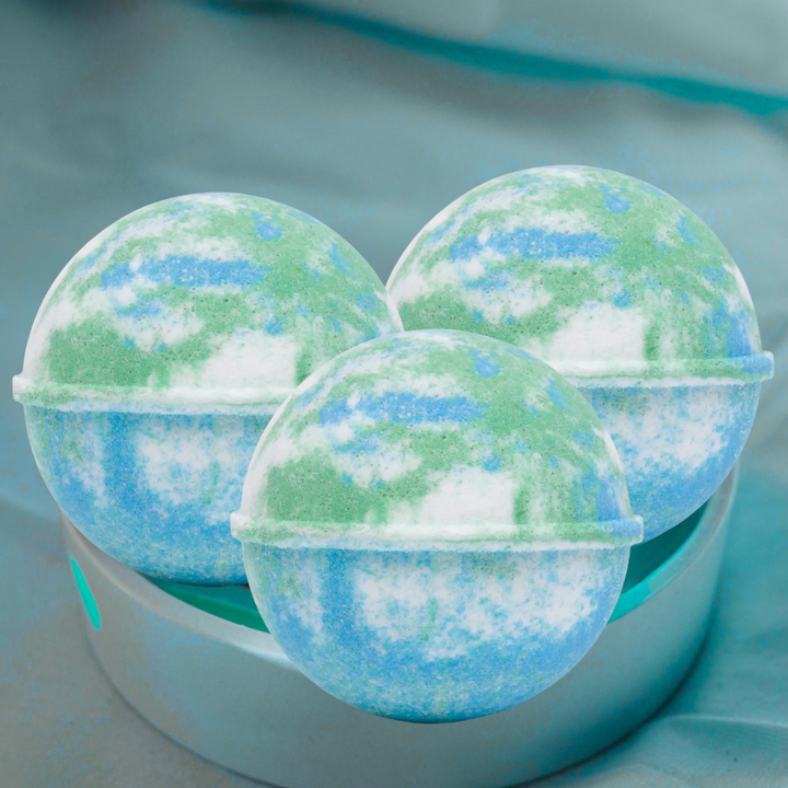 Mother Earth Bath Bomb dissolving in water with natural sprinkles and earthy scent for skin nourishment