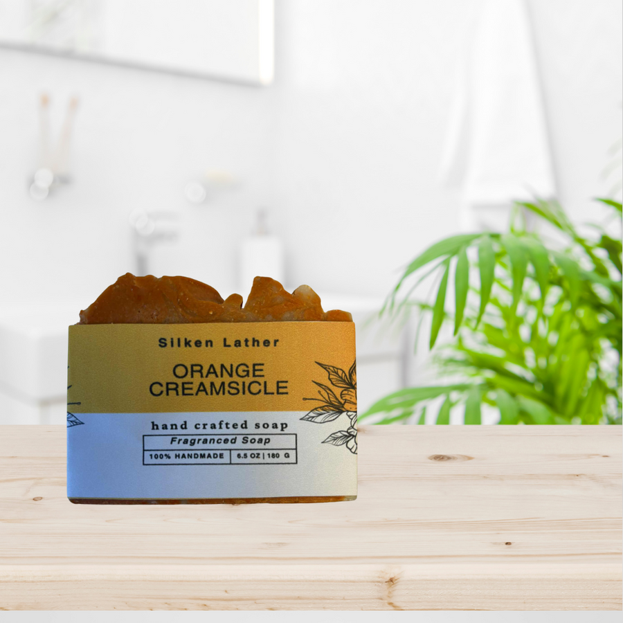 Handcrafted Orange Creamsicle Soap 180g with creamy orange and vanilla scent, vegan and moisturizing.