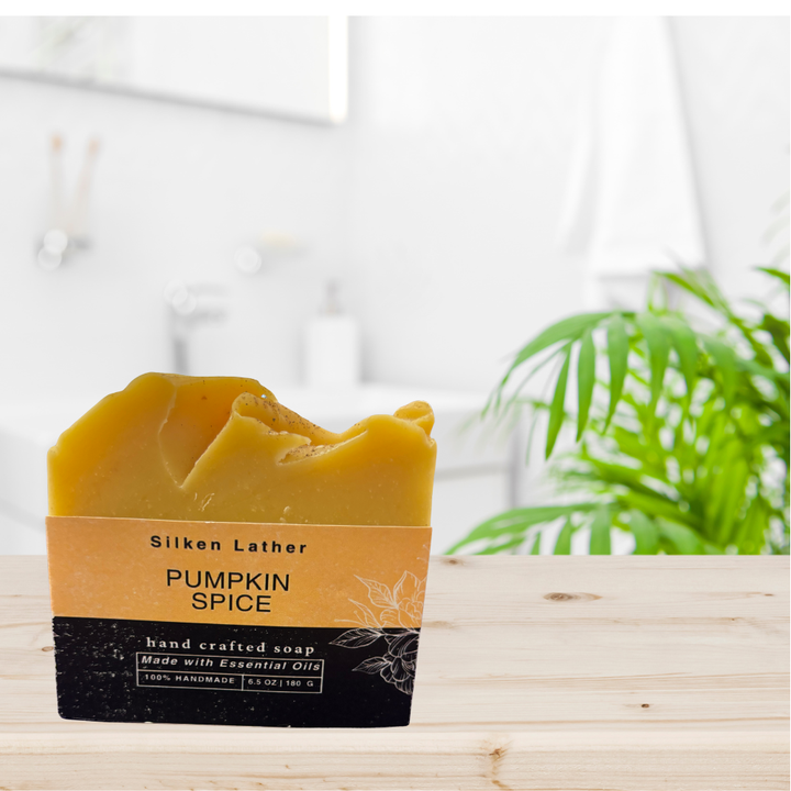 Handcrafted 180g Pumpkin Spice Soap bar infused with cinnamon, clove, nutmeg, and orange, made with natural oils for gentle, vegan skincare