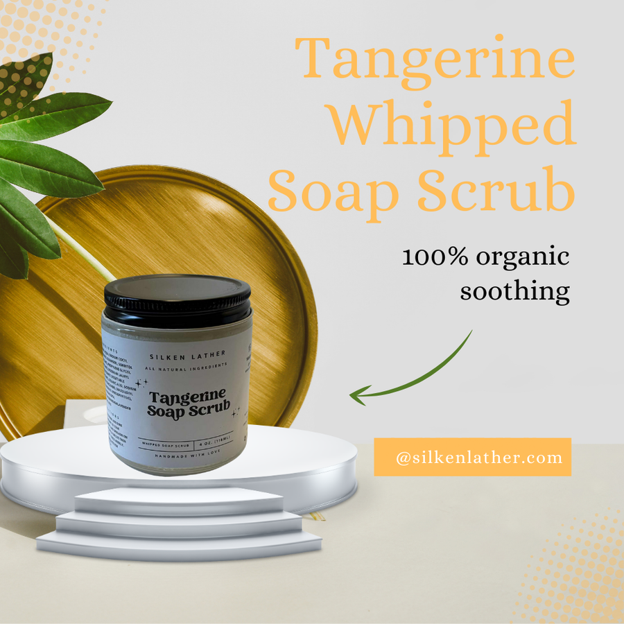Tangerine Whipped Soap Scrub in jar with whipped texture and tangerine and lavender scent ingredients