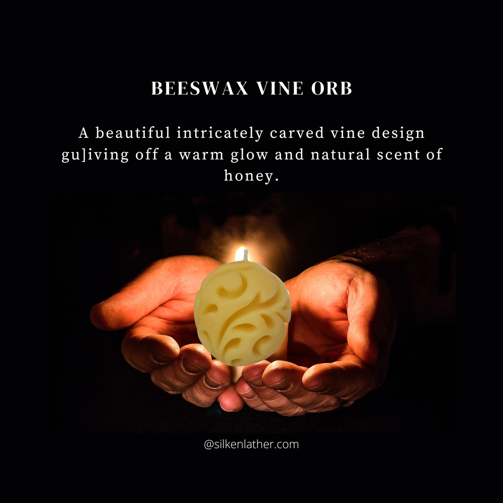Hand-poured beeswax vine orb candle 3.25 inches with carved vine design and natural honey aroma