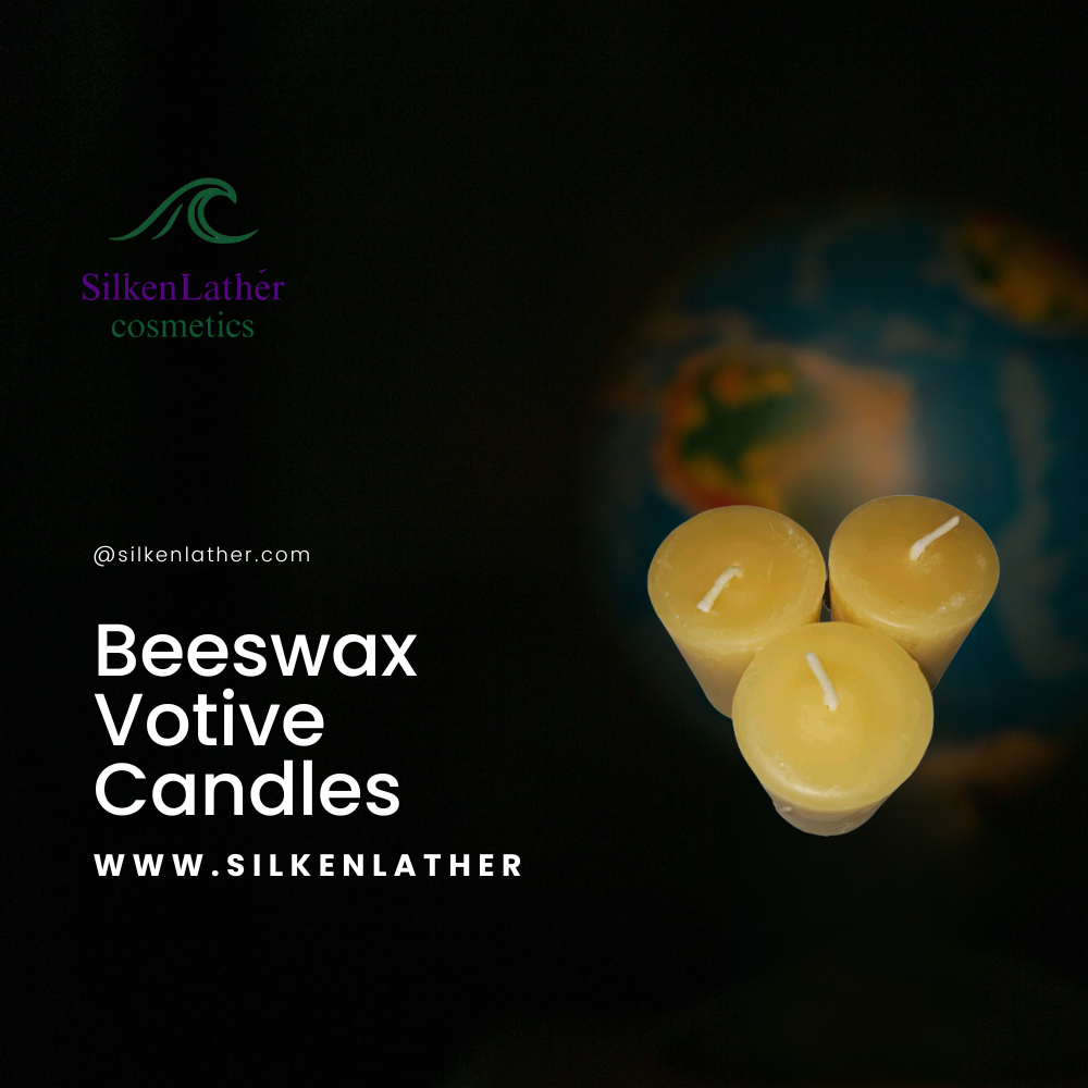 Three-pack of beeswax votive candles emitting a warm golden glow in standard holders